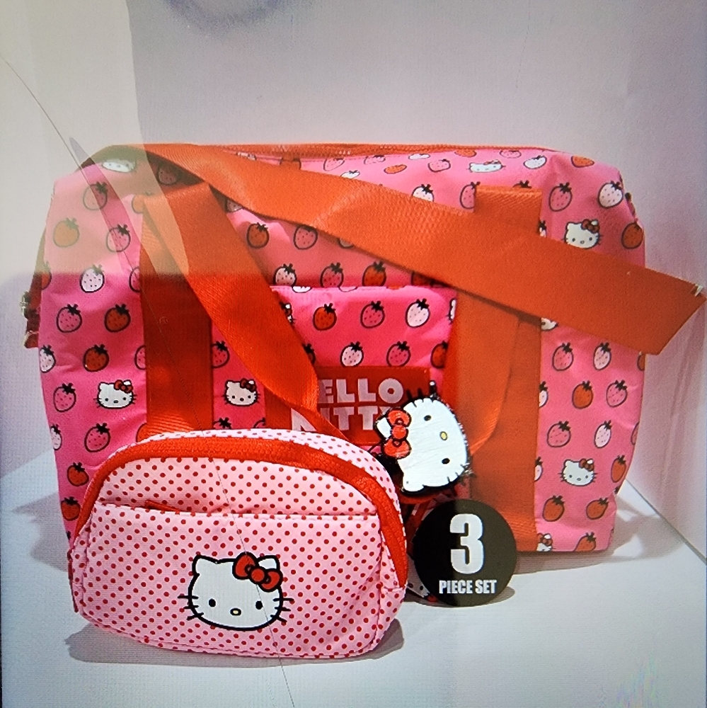 NWT Beautiful 3peice Travel Bag Hello Kitty 🍓! Will receive a free Hello Kitty